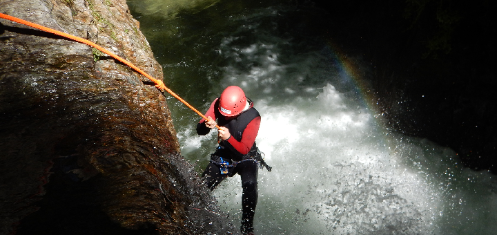 Man Abseiling in a canyon during a Challenge The Wild UK Adventure Retreat